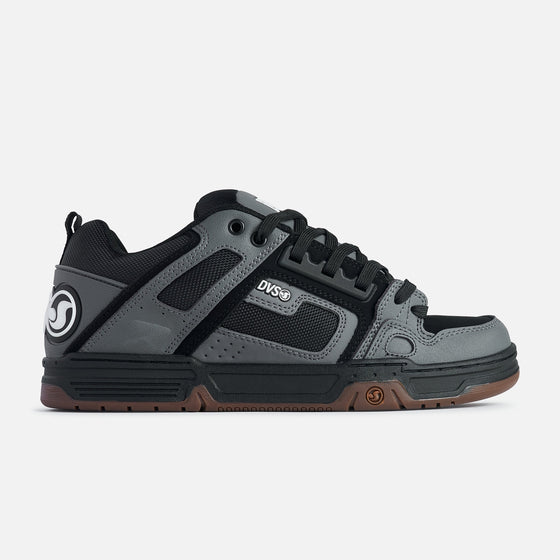 Gray and black sneaker with visible DVS Shoes branding on a white background
