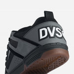 Gray and black sneaker with visible DVS Shoes branding on a white background