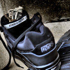 Close-up of the hidden stash pocket inside the tongue of the DVS Enduro Heir skate shoe.
