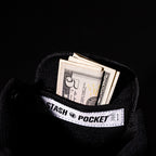 Close-up of the hidden stash pocket inside the tongue of the DVS Enduro Heir skate shoe.