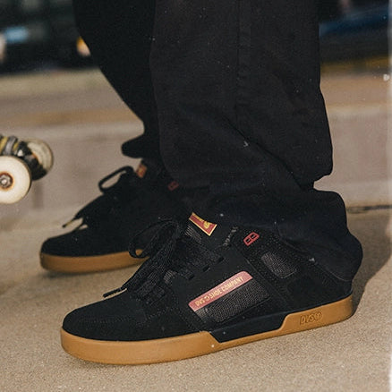 A three-panel collage showing a man wearing black skate shoes with tan and brown gum soles, including a close-up of the shoes, a photo of him sitting in a car window, and a full-body shot of him skateboarding outdoors.