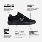 Black Vaporcell Elite skate shoes with multiple callout labels and text describing features like padded upper, bruise control, vaporcell midsole, and contoured cupsole on a light gray background.